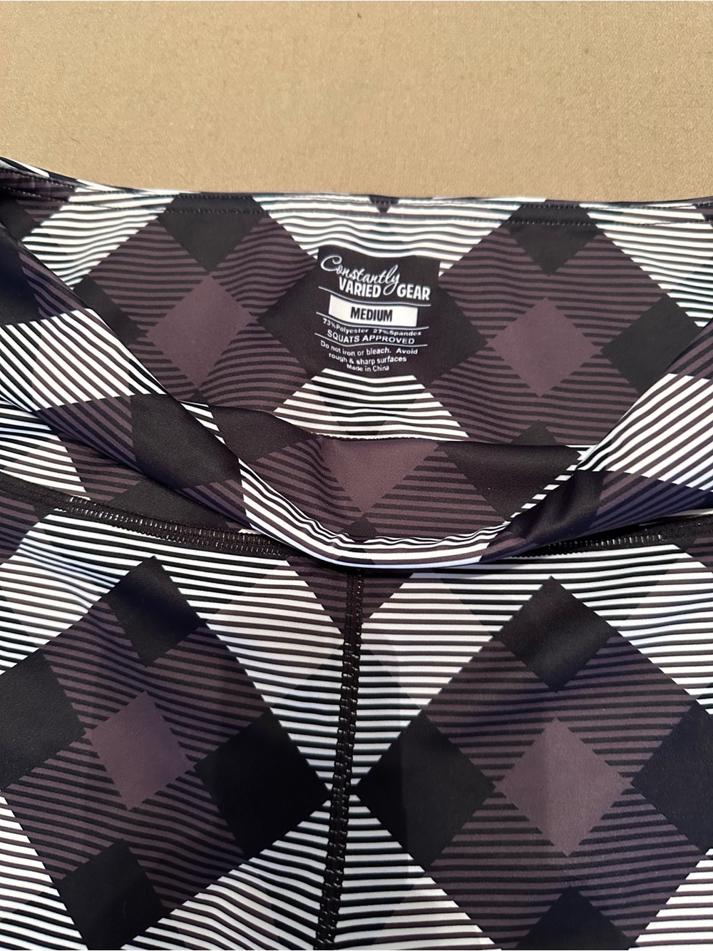 Women’s Constantly Varied Gear Black, White & Gray Plaid Capri Leggings - Picture 3 of 4